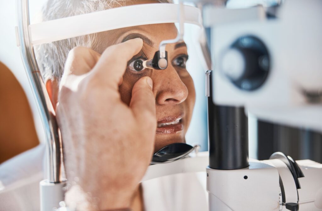A woman undergoes an eye test at the eye doctors